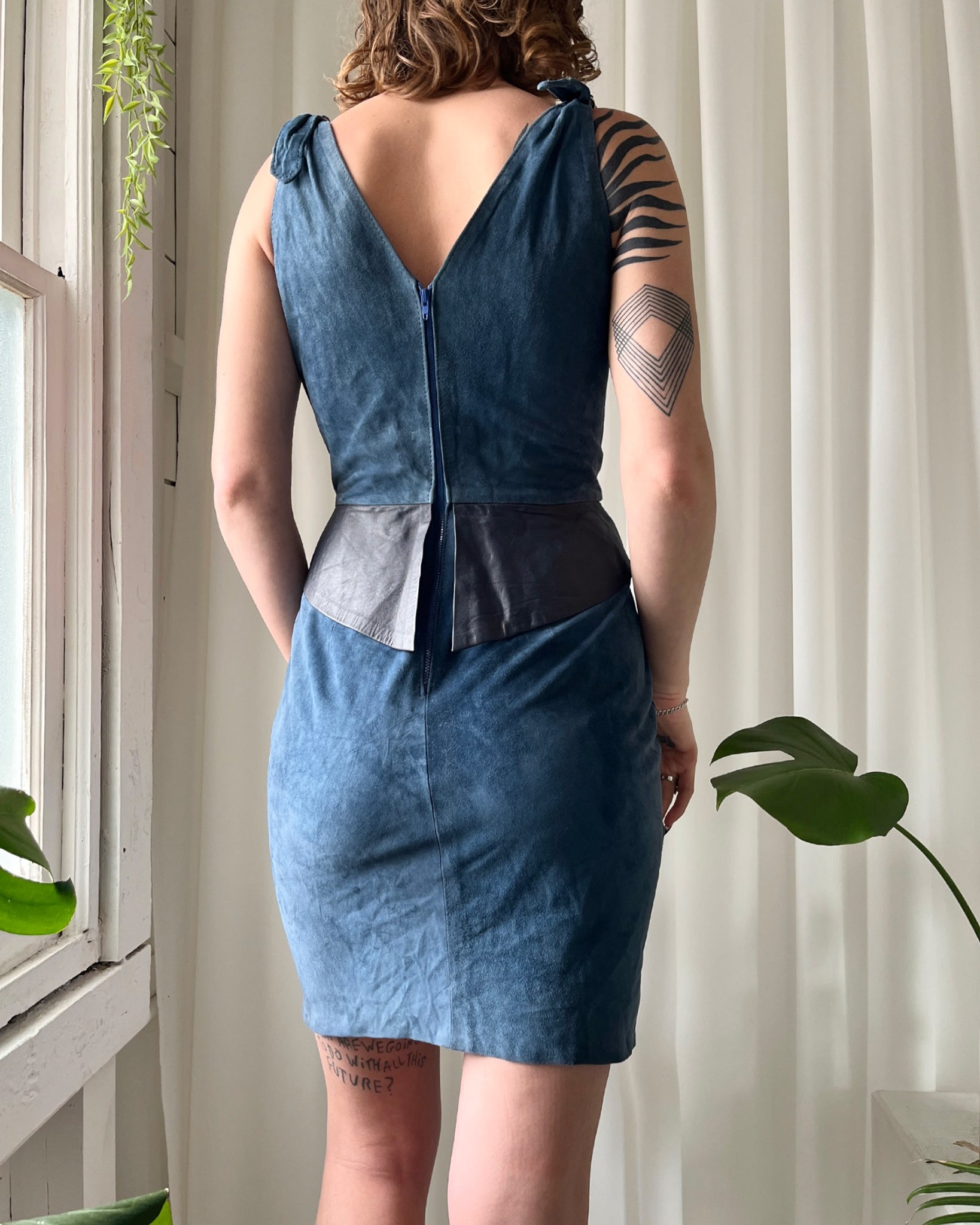 https://luckyvintageseattle.com/cdn/shop/files/lucky-vintage-seattle-1980s-80s-blue-leather-garter-belt-mini-dress_6_2048x.jpg?v=1684610533